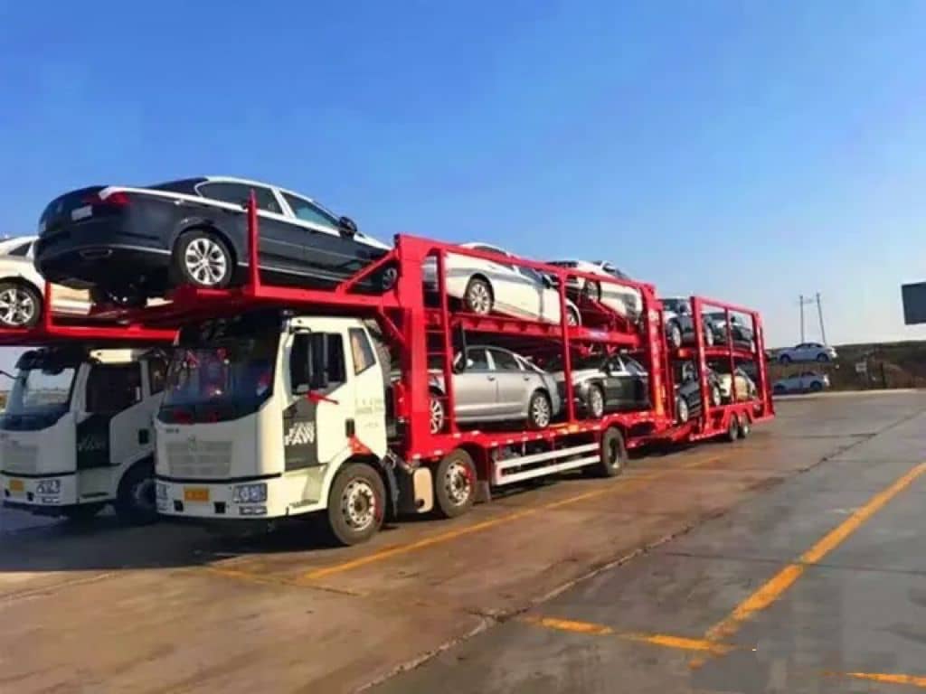 Car transporter trucks dispatching export vehicles