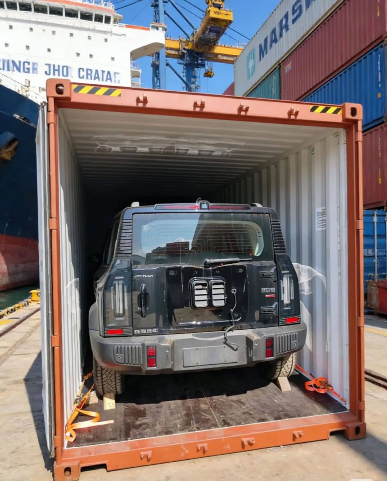 SUV secured inside a 40HQ shipping container