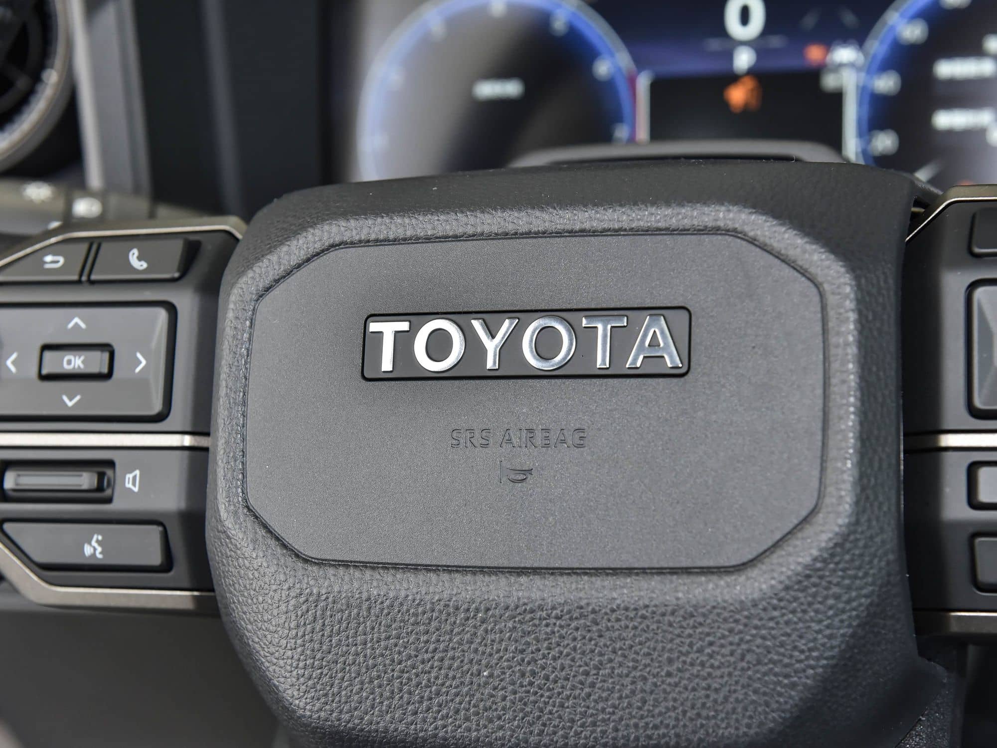 2025 Toyota Land Cruiser Prado (LC250) interior: steering wheel and instrument cluster
