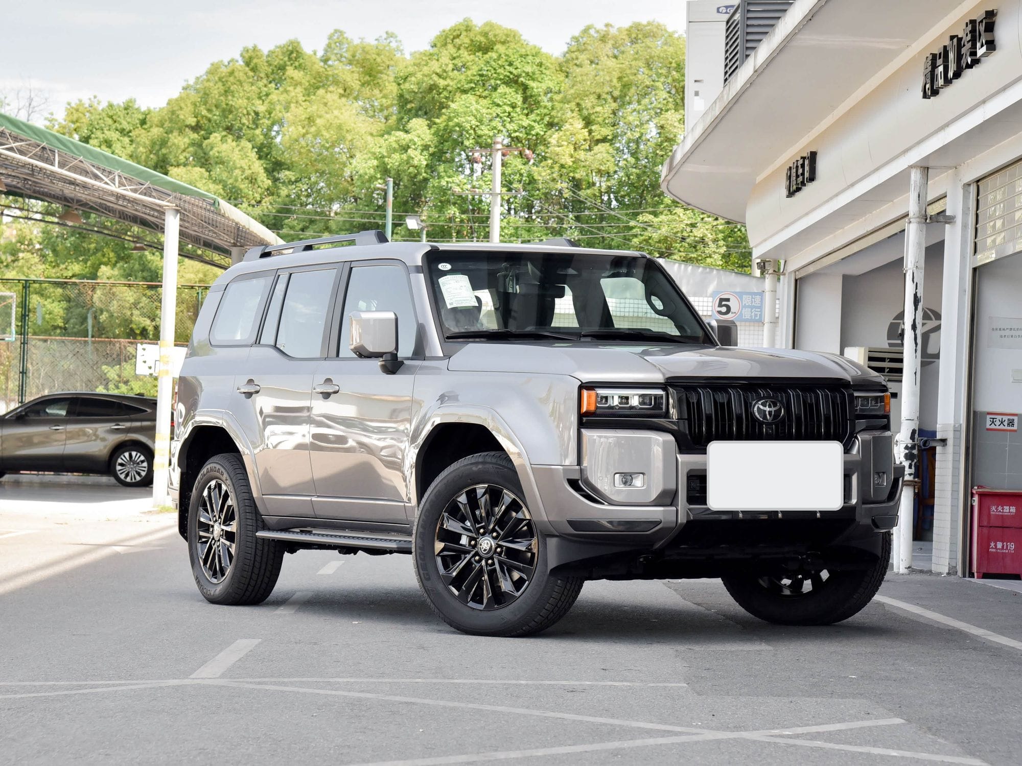 2026 Toyota Land Cruiser Prado in Platinum Bronze, front three-quarter view