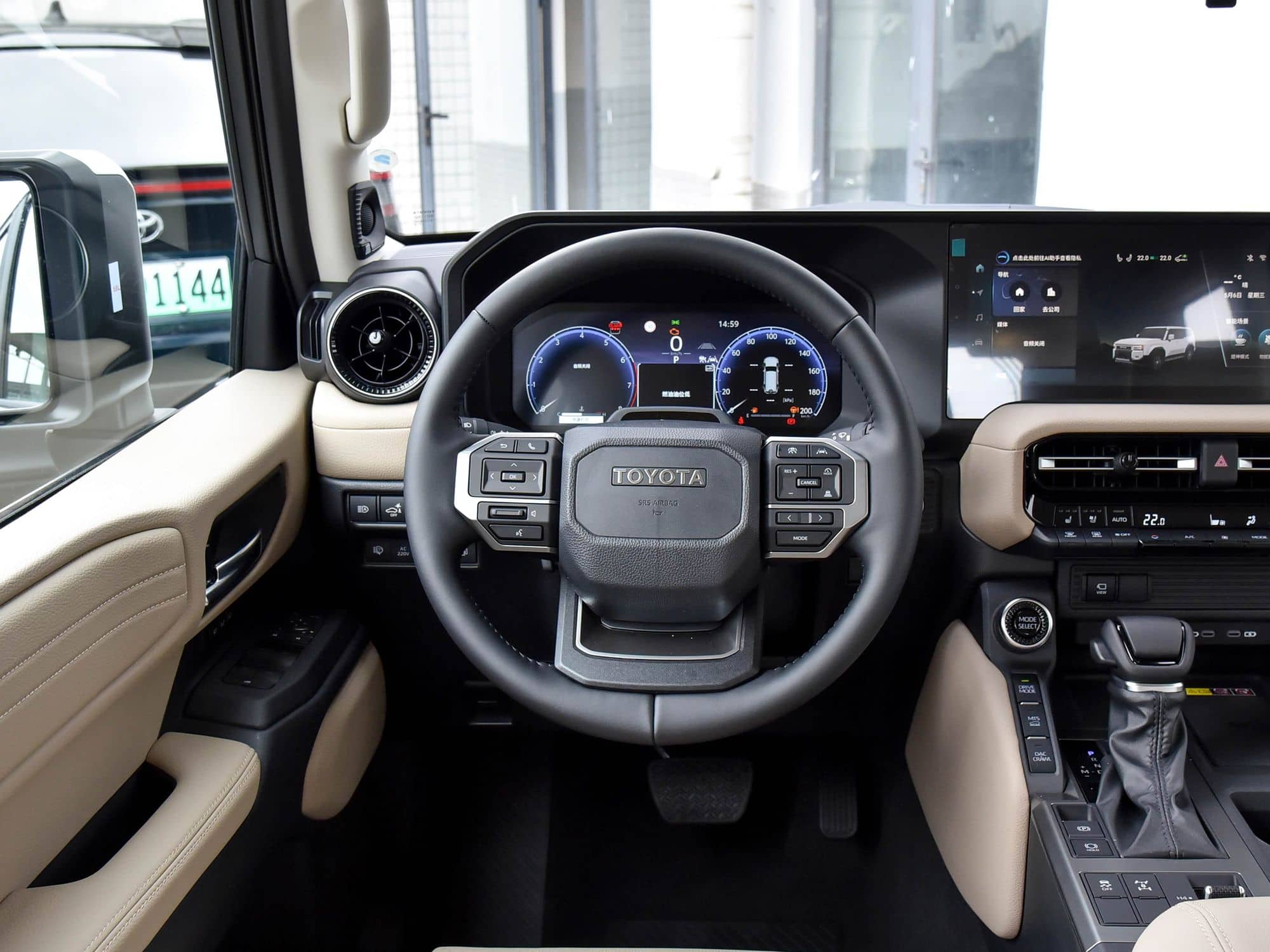 2026 Toyota Land Cruiser Prado (LC250) interior: steering wheel and instrument cluster